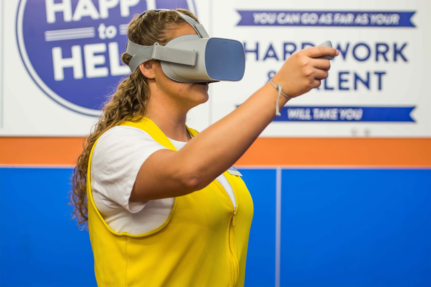 Associate Abigail trains using an Oculus VR Headset