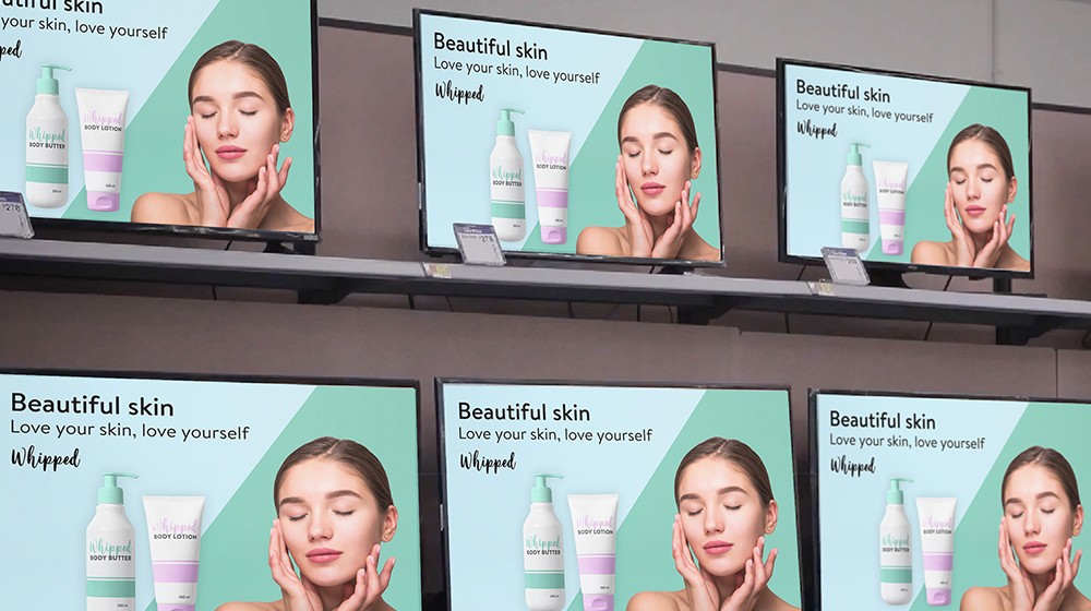 Six TVs with a "beautiful skin" ad is shown on the Walmart Connect TV wall.