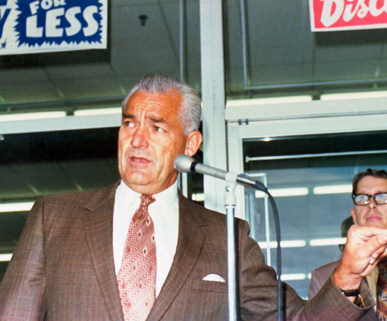 Sam Walton at the ribbon cutting for the first Walmart in Rogers, Arkansas.
