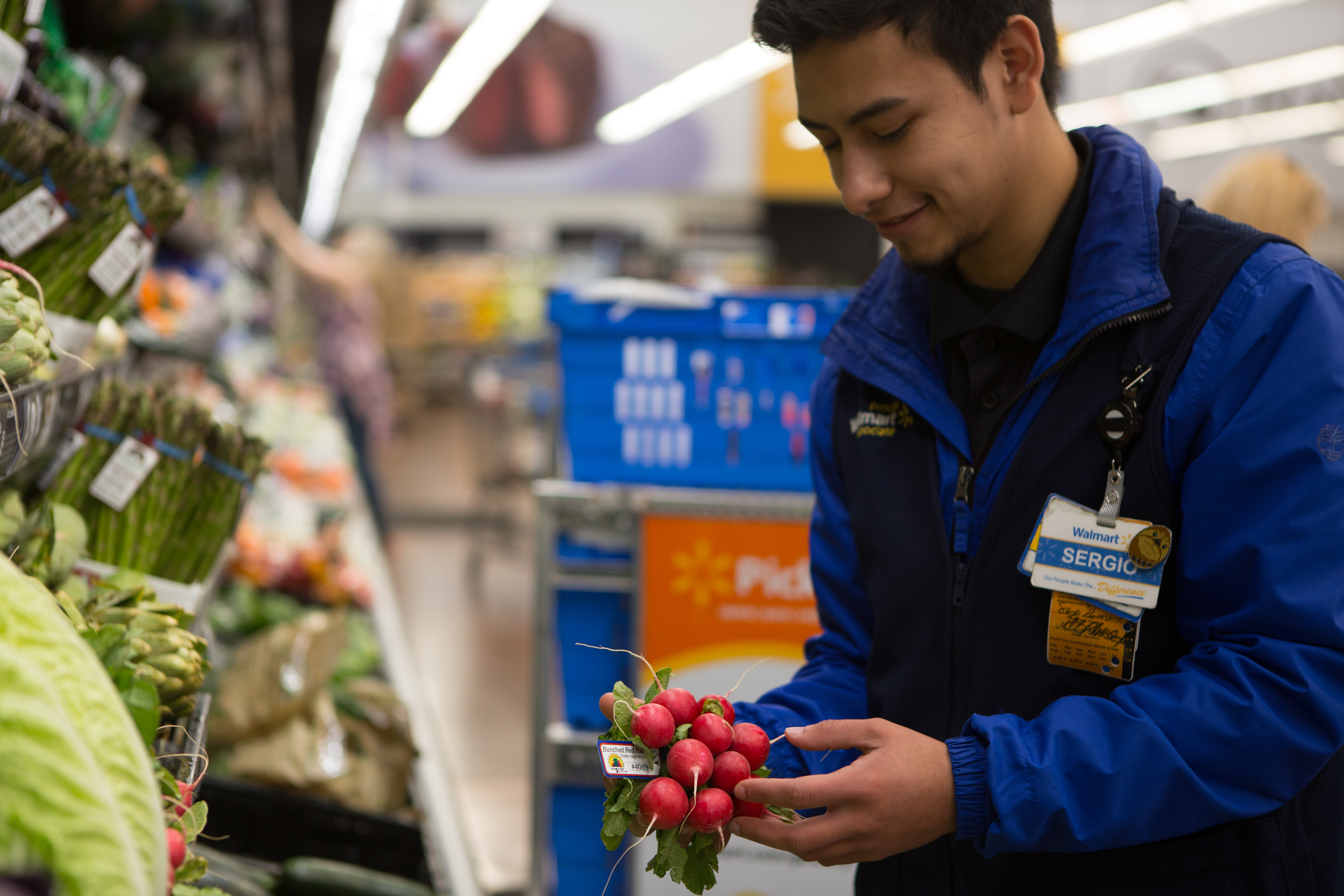 Walmart personal shopper selects radishes
