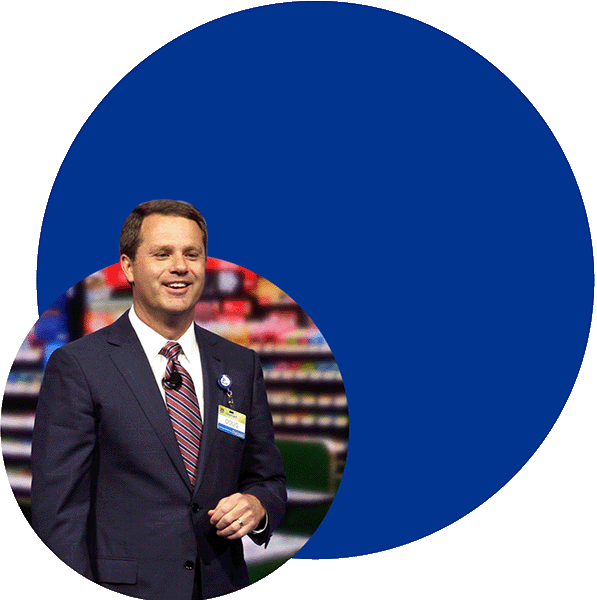 Cutout photo of Doug with a blue circle in the background